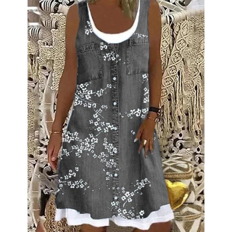 Atractivo vestido corto de mujer con efecto denim, sin mangas, para un look fresco y casual.
