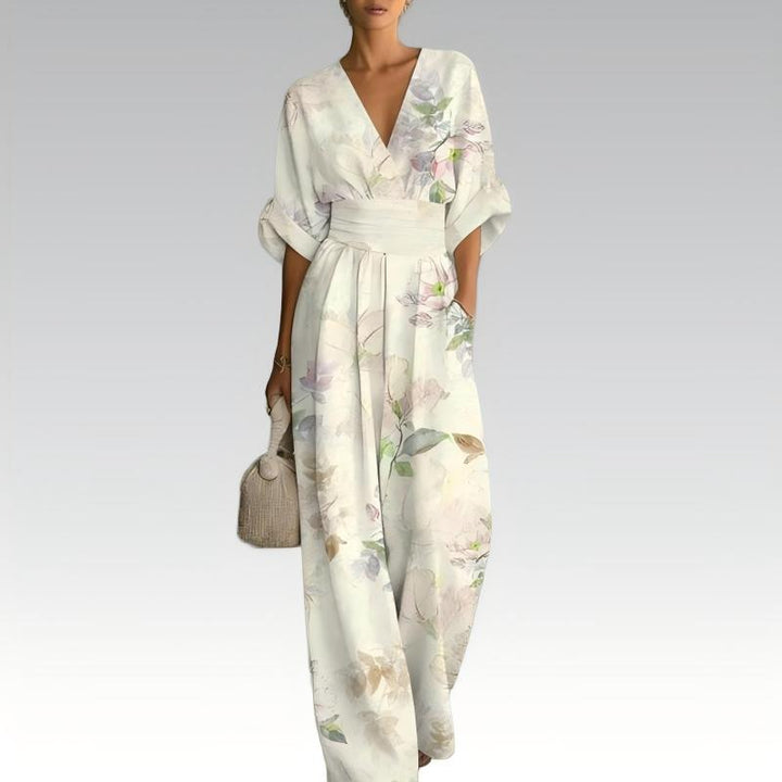 Mono floral vibrante de verano para mujer, con escote V y cintura estilizada, muy chic.