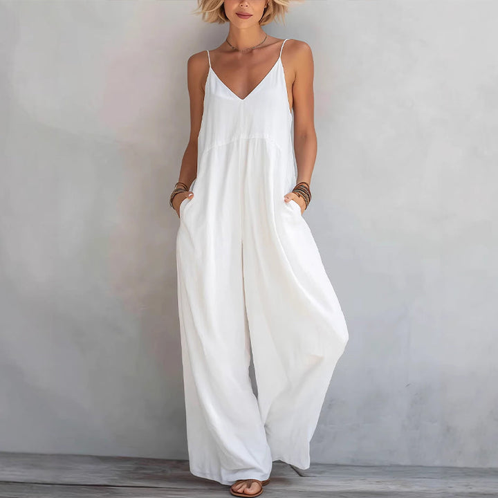 Mono palazzo de moda para mujer, estilo veraniego con tirantes finos, pierna ancha y corte elegante-casual.