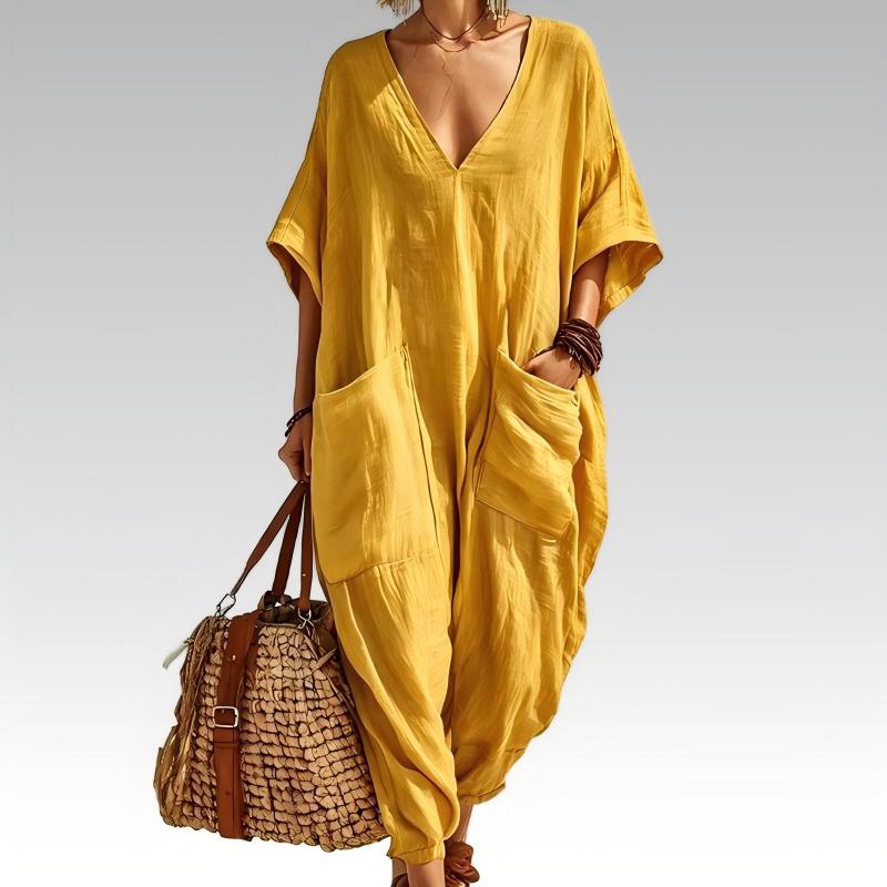 Mono de moda para mujer, diseño amplio y versátil con escote V. Ideal para looks de verano casuales y cómodos.