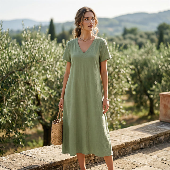 Moda mujer: vestido maxi versátil, cuello V, bolsillos, para día o noche.