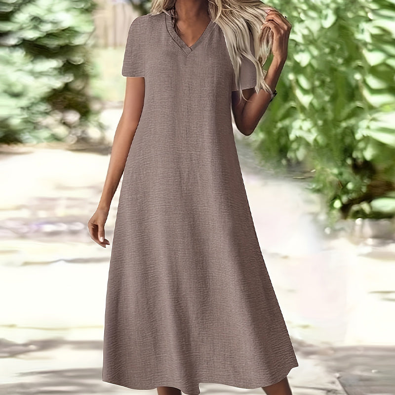 Vestido maxi fluido mujer, cuello V, bolsillos, para look casual o elegante de verano.