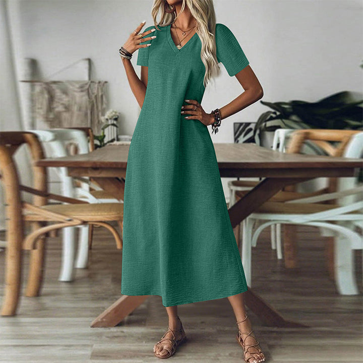 Vestido de verano mujer, maxi, cuello V, con bolsillos, diseño cómodo y fluido.