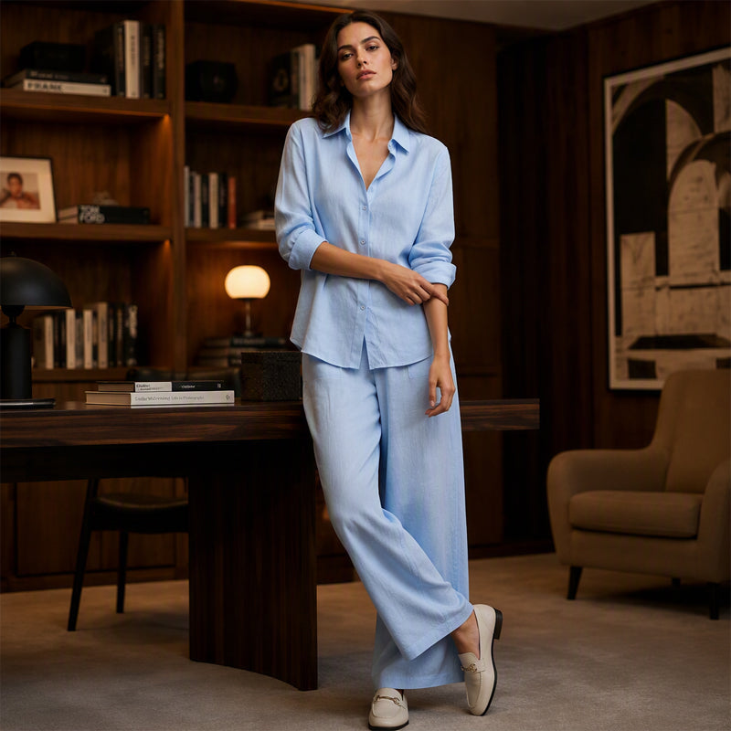 Conjunto fluido de camisa abotonada y pantalón ancho para mujer. Comodidad y estilo chic para un outfit elegante.
