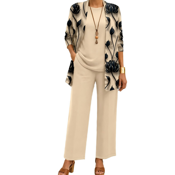 Conjunto elegante de tres piezas para mujer con cárdigan estampado, blusa y pantalón fluido. Ideal casual chic.