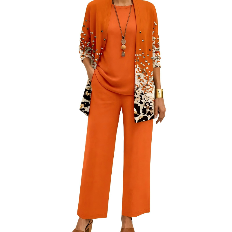 Conjunto casual chic de mujer con cárdigan estampado. Incluye blusa y pantalón fluido, perfecto para otoño.