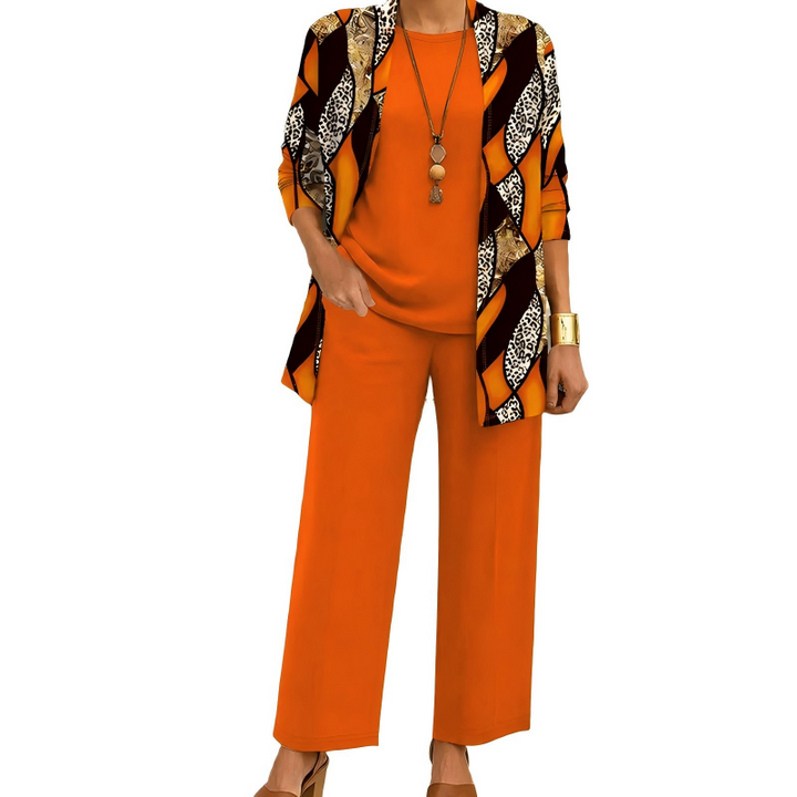 Conjunto femenino de tres piezas: cárdigan estampado, blusa y pantalón fluido. Estilo elegante para primavera/otoño.