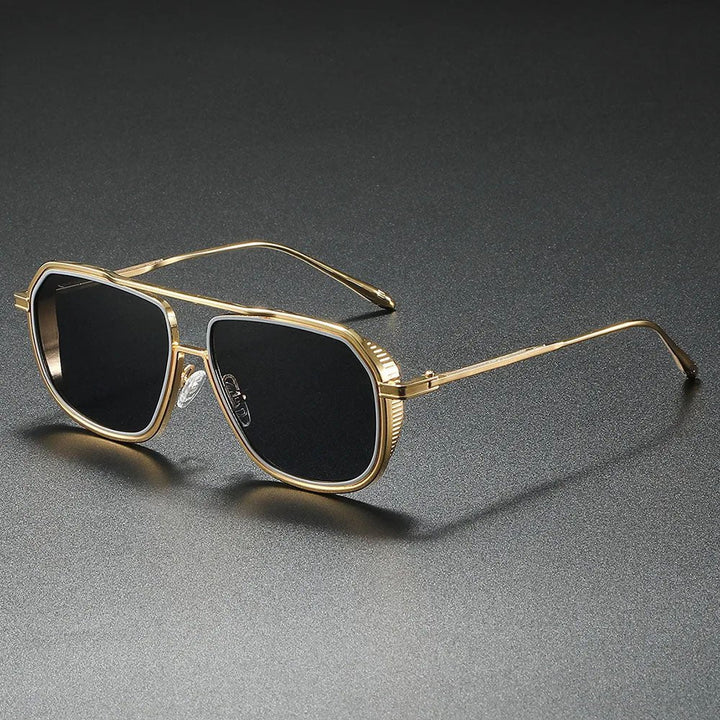 Gafas de sol aviador unisex con lentes degradados marrones y montura metálica dorada. Estilo clásico y protección UV.