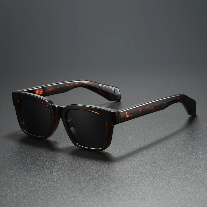 Gafas de sol unisex cuadradas retro de moda, con montura gruesa y lentes polarizadas para estilo y protección.