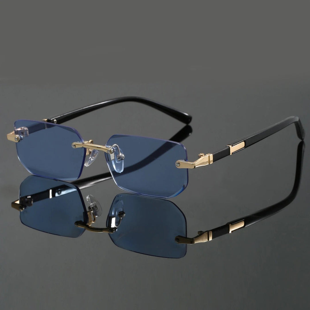 Gafas de sol elegantes unisex sin montura, con protección UV400 para tus ojos, perfectas para el viaje y la playa.