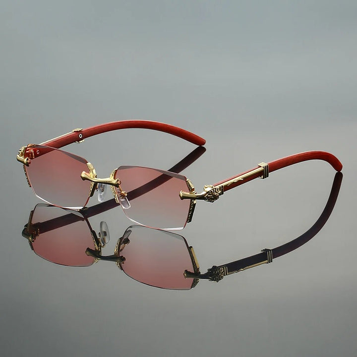 Protección UV400: gafas de sol unisex sin montura. Diseño moderno y elegante con varillas doradas.