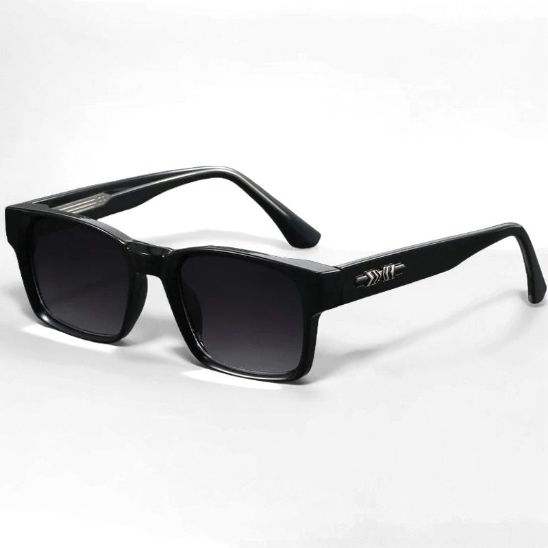 Gafas de sol cuadradas de acetato azul con lentes degradadas. Protección UV400 para un look moderno unisex.