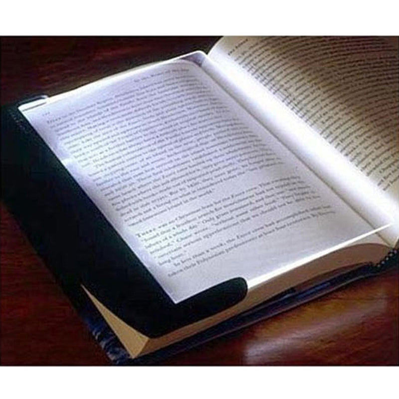 Lámpara LED para lectura, se fija al libro. Proporciona luz suave y cómoda. Accesorio portátil de viaje.