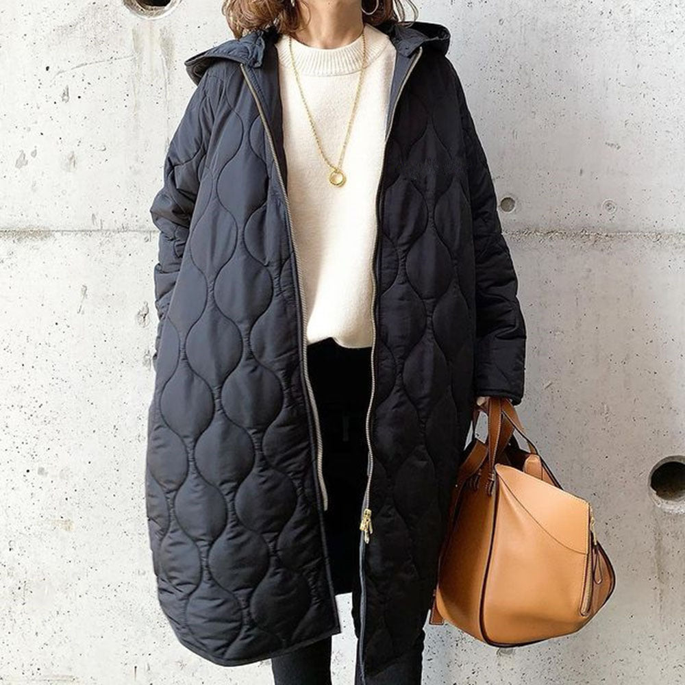 Abrigo oversize de mujer con capucha y estampado de rombos, cálido y moderno para el invierno.