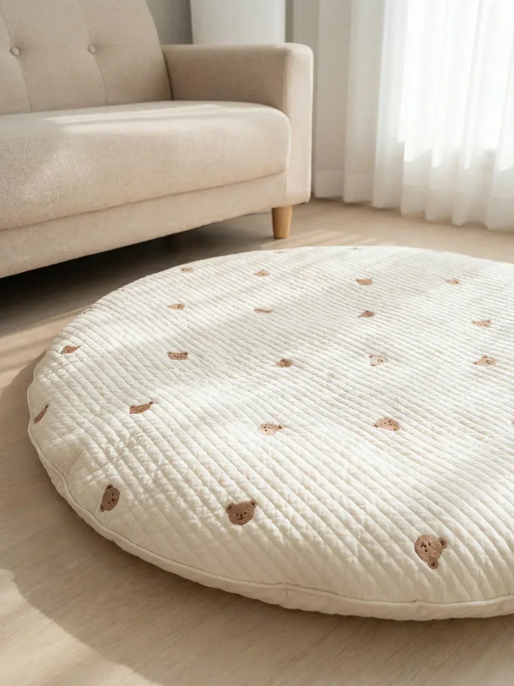 Alfombra infantil circular de algodón, acolchada, segura para bebés, ideal para juegos y desarrollo.