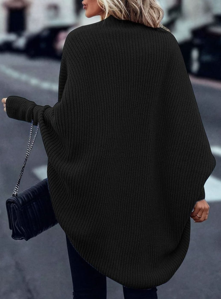 Prenda de punto oversize de mujer, cárdigan largo y abierto, perfecto para invierno y comodidad.