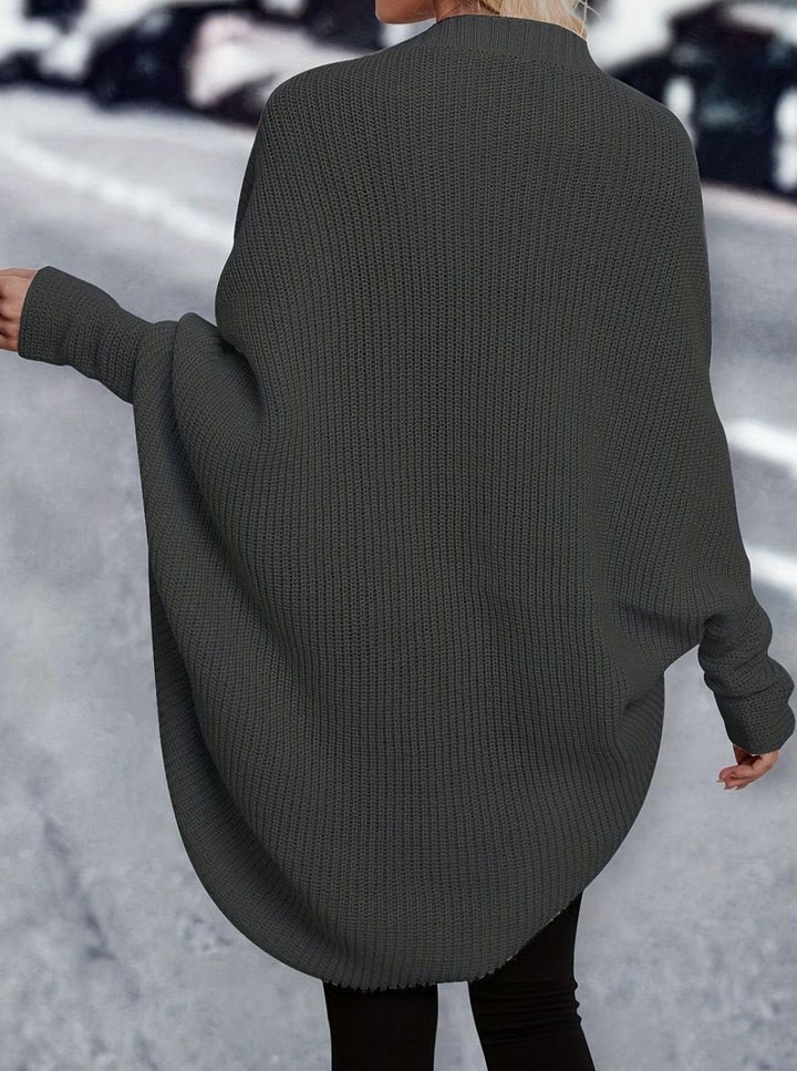 Cómodo cárdigan de punto oversize para mujer, diseño largo y abierto, calidez y confort en otoño.