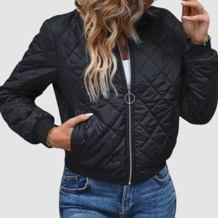 Cazadora bomber acolchada negra corta mujer, estilo urbano. Perfecta para entretiempo.