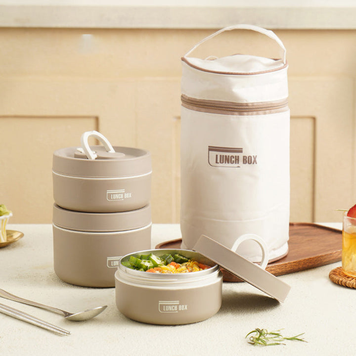 Contenedor de alimentos térmico de acero inoxidable, con bolsa, para un almuerzo completo.