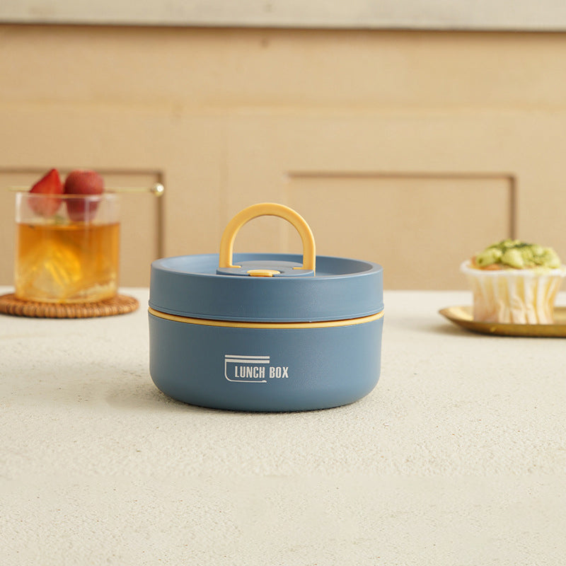 Fiambrera bento multicapa, resistente y portátil, conserva la temperatura de tus alimentos.