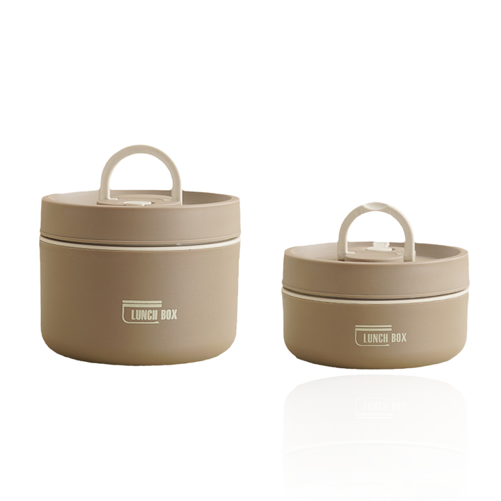 Contenedor bento multicapa de acero inoxidable, ideal para organizar diferentes alimentos.