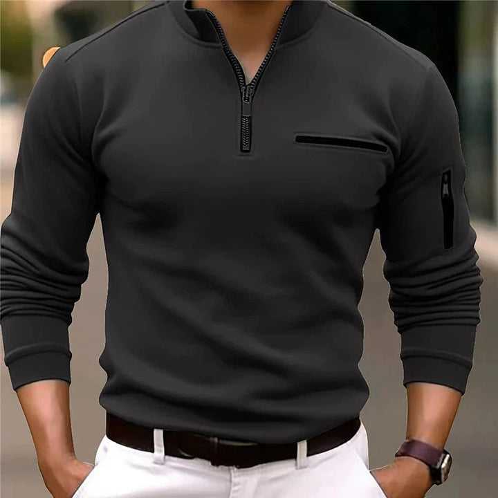 Suéter cálido de hombre con manga larga, cremallera y bolsillo. Prenda básica cómoda para otoño e invierno.