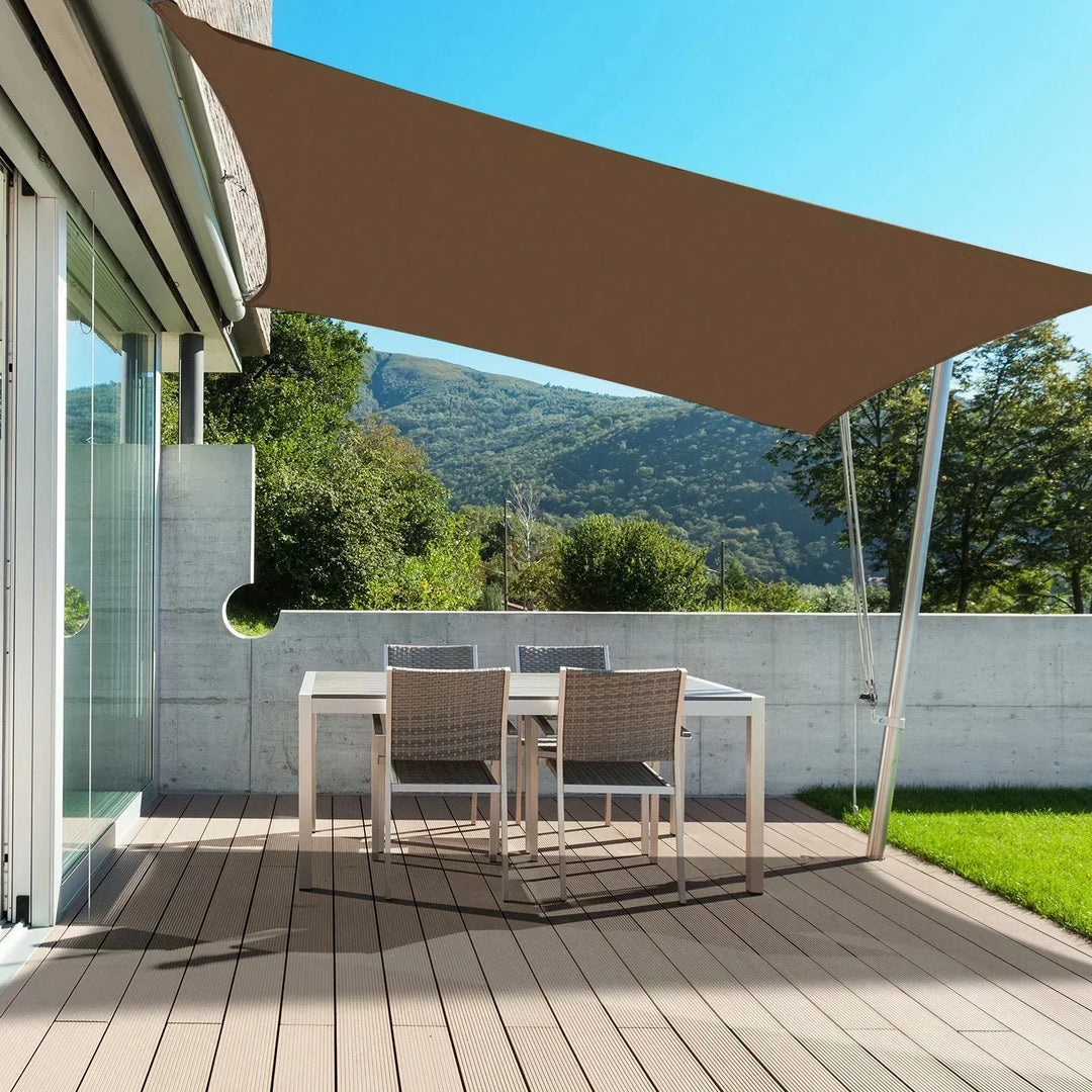 Vela de sombra para jardín o terraza. Toldo resistente a los rayos UV que crea un espacio fresco y protegido.