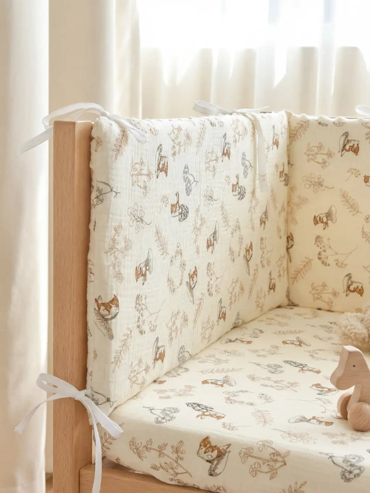 Seguridad infantil garantizada con protector de cuna acolchado, reversible de algodón y minky para bebé.