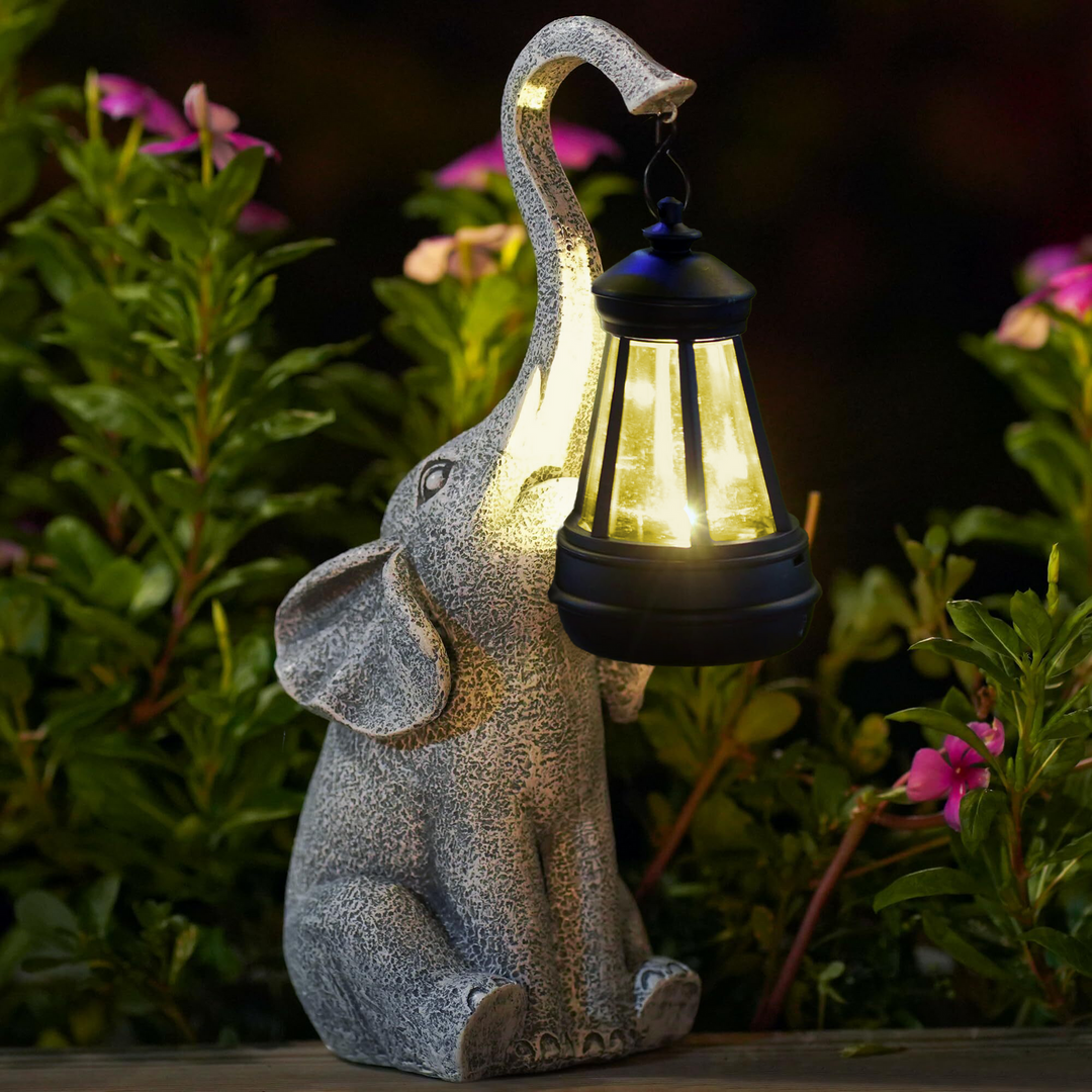 Lámpara solar decorativa de jardín con figura de elefante, ideal para terraza o balcón.