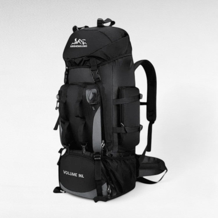 Vista trasera de mochila de senderismo 90L, con sistema de ventilación, ideal para largas rutas y aire libre.