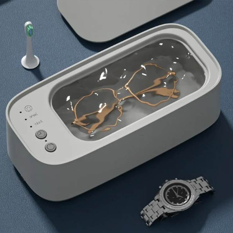 Limpiador ultrasónico profesional para joyas, gafas y relojes. Ofrece limpieza profunda y brillo en el hogar.