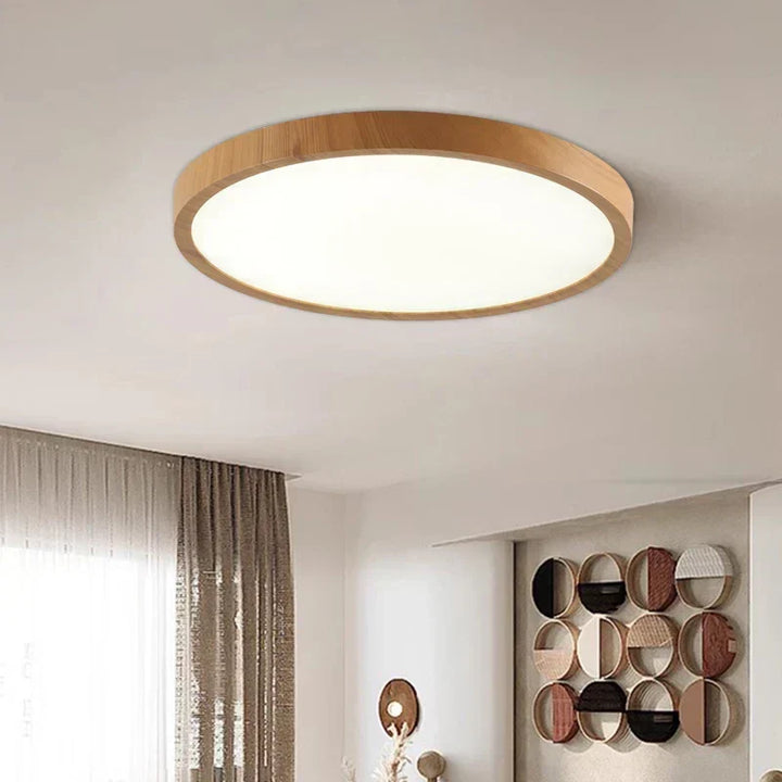 Lámpara de techo LED circular ultradelgada, ideal para espacios modernos. Iluminación eficiente y diseño minimalista.