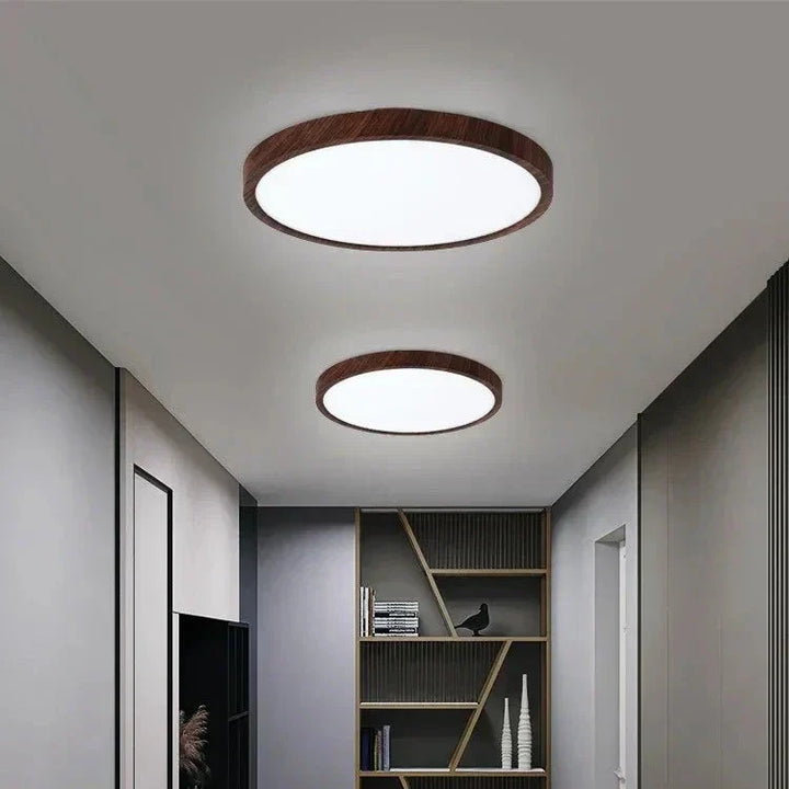 Lámpara de techo LED circular con acabado moderno. Diseño ultradelgado, iluminación cálida y eficiente.