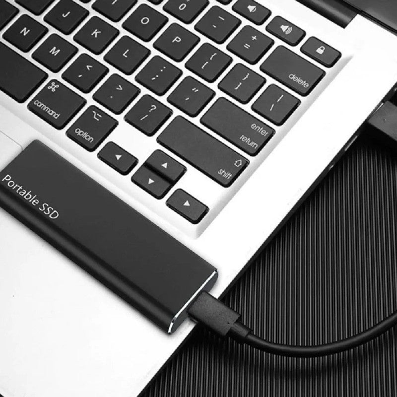 Almacenamiento de datos portátil de 4TB, SSD compacto USB-C, carcasa metálica duradera.