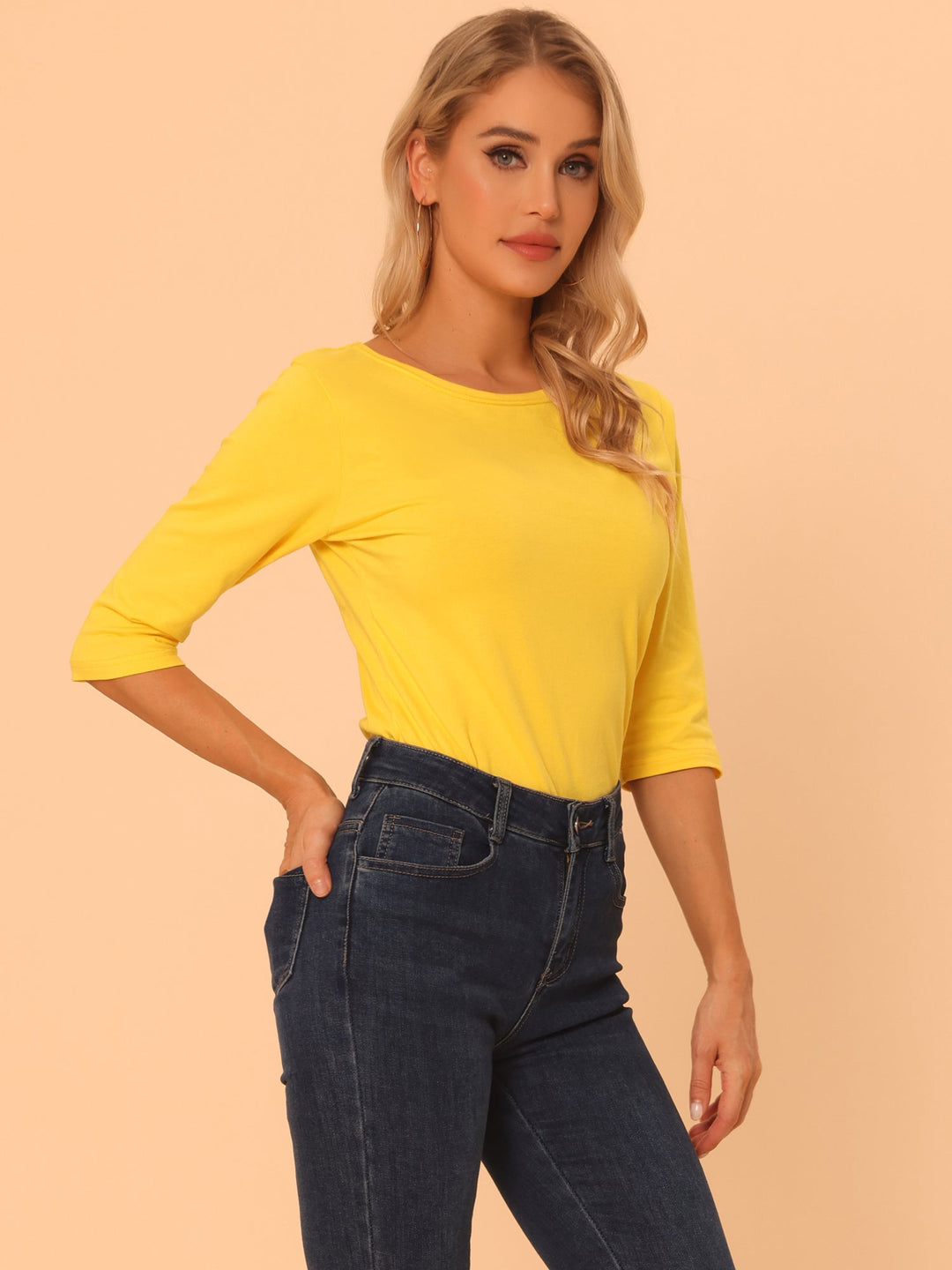 Camiseta casual de mujer, manga 3/4. Cuello redondo. Versátil para el día a día.