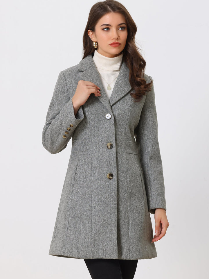 Abrigo largo de mujer, ideal para invierno, con botones y corte impecable.