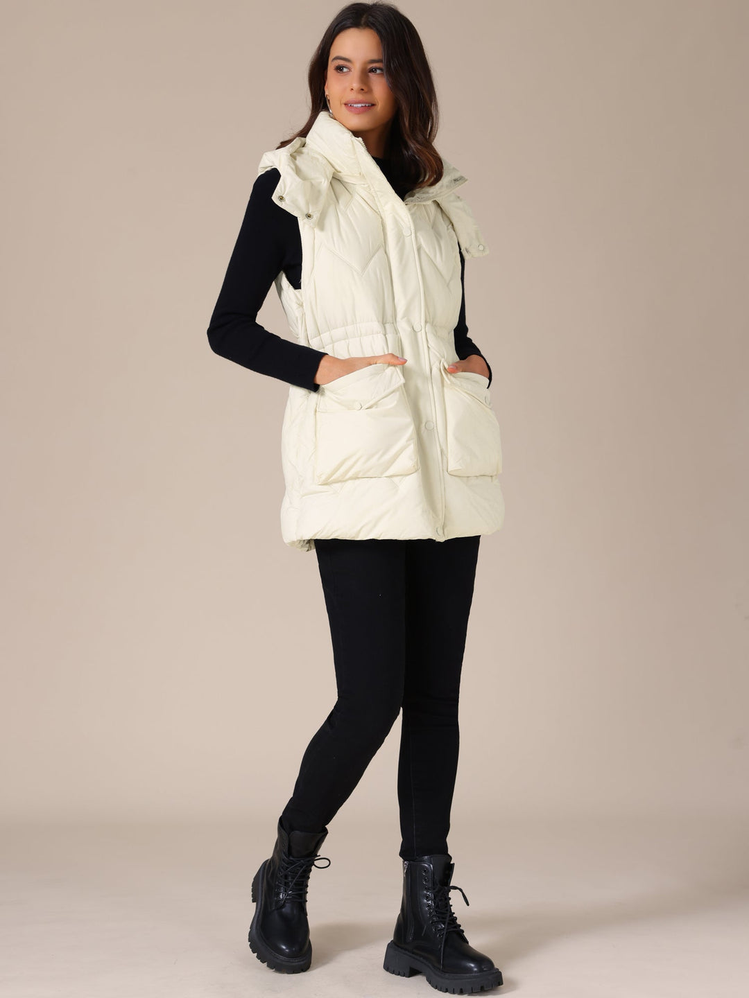 Prenda exterior de mujer: chaleco KALMORA largo, acolchado y con capucha.