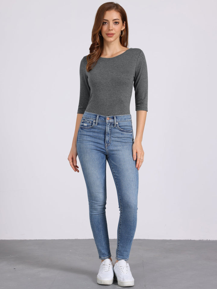Prenda femenina: camiseta de mujer, manga 3/4. Cuello redondo. Comodidad y estilo básico.