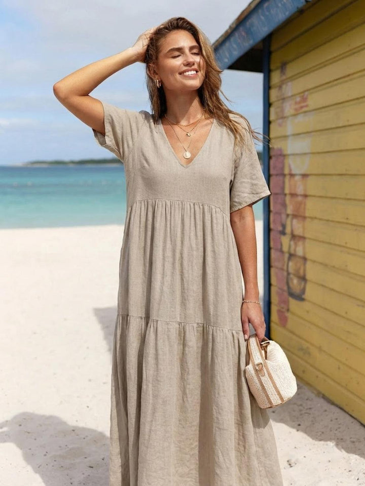 Vestido bohemio con escote V para mujer, maxi y estiloso, ideal para vacaciones en la playa.