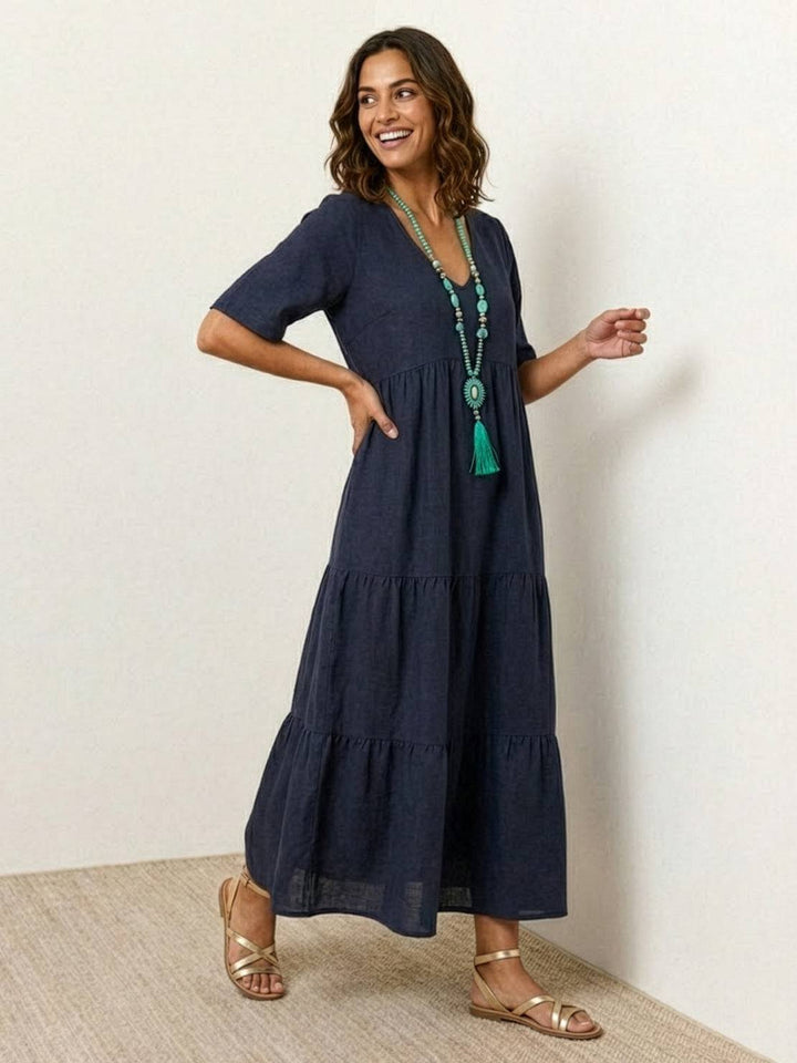 Look de playa: vestido maxi fluido para mujer con escote V, estilo bohemio.