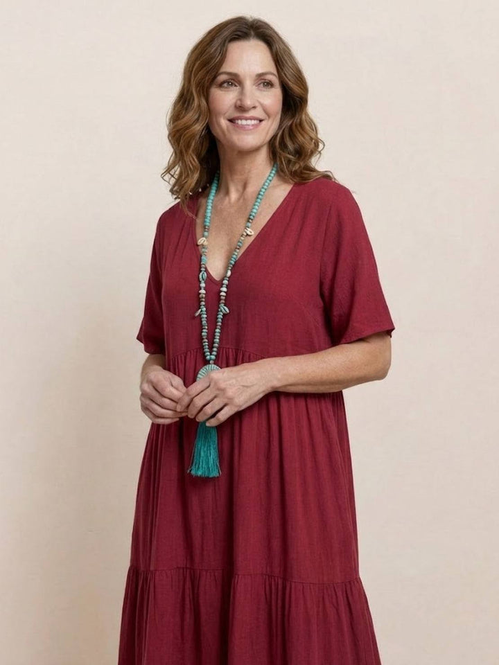 Vestido de mujer estilo bohemio, maxi y fresco, con escote V, ideal para la playa.