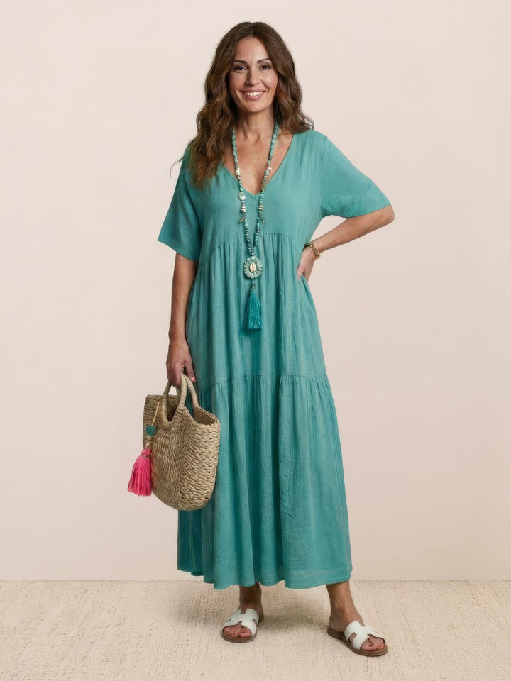 Vestido casual bohemio maxi para mujer, escote V, ideal para un estilo fluido de verano.