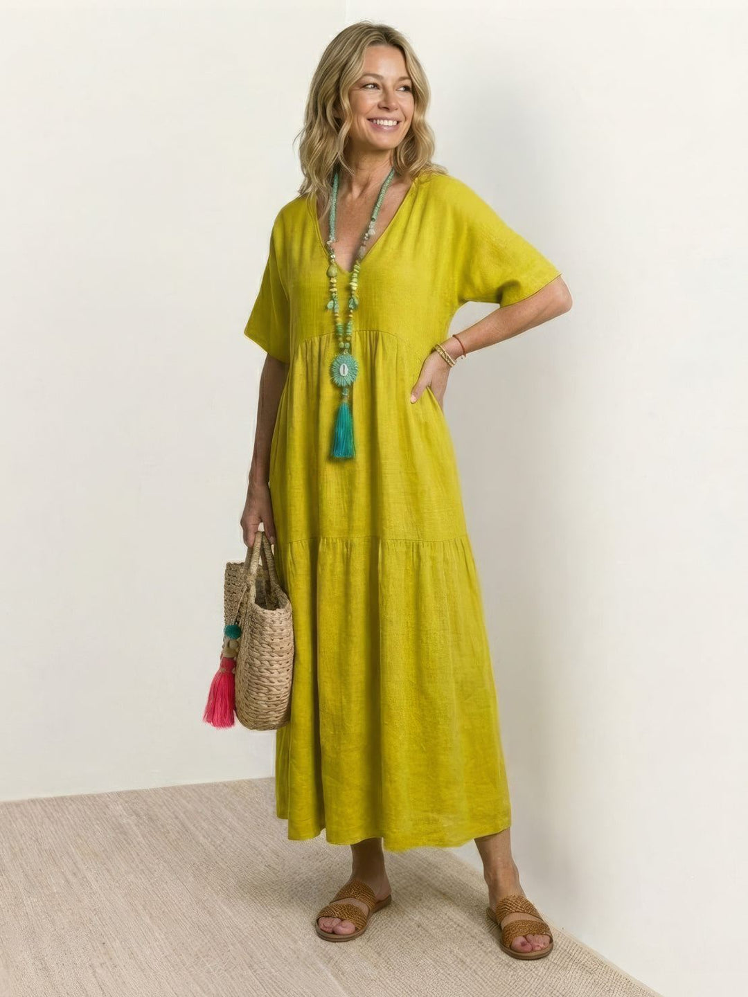 Vestido de mujer bohemio con escote V, maxi y cómodo, perfecto para la playa en verano.