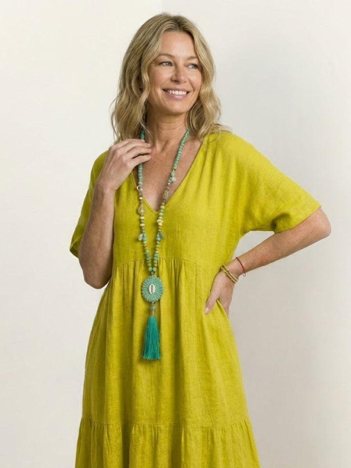 Vestido fluido de mujer, maxi, bohemio, con escote V, perfecto para un día en la playa.