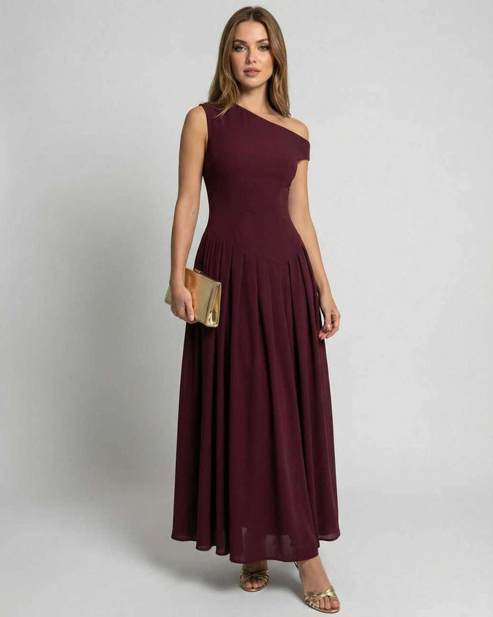 Vestido maxi burdeos elegante para noche con escote asimétrico. Ideal para fiesta o invitada de boda.