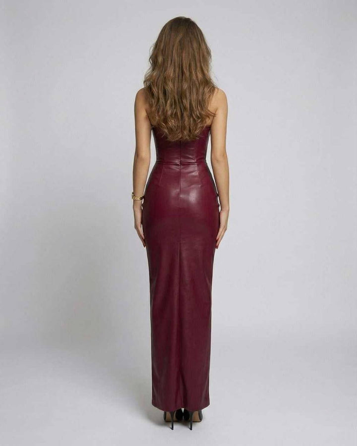 Vestido maxi formal sin mangas ajustado para mujer, realzando la silueta esculpida. Perfecto para noches elegantes.