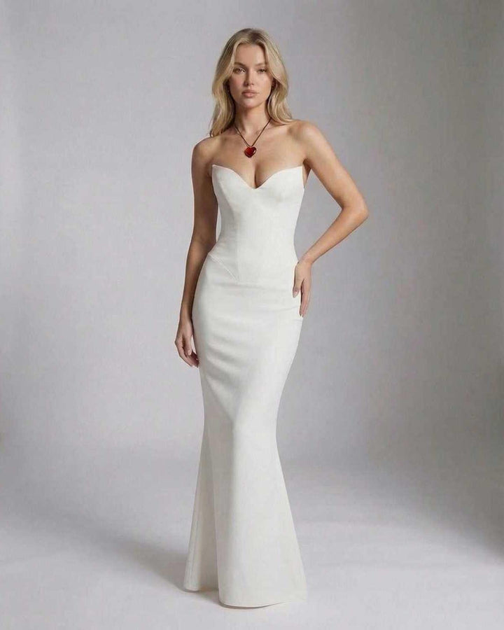 Vestido maxi sirena blanco cautivador, ideal para fiestas, bodas y noches elegantes.