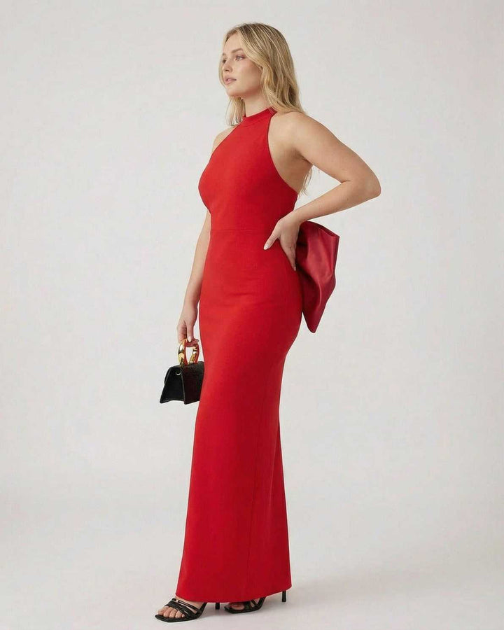 Vestido de mujer con cuello halter y lazo trasero. Estilo sofisticado para fiestas de noche. Maxi sin mangas.