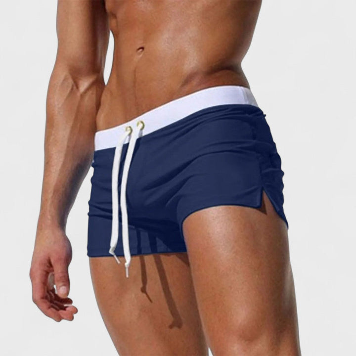 Bañador deportivo para hombre de secado rápido. Ofrece confort y versatilidad en playa y piscina.