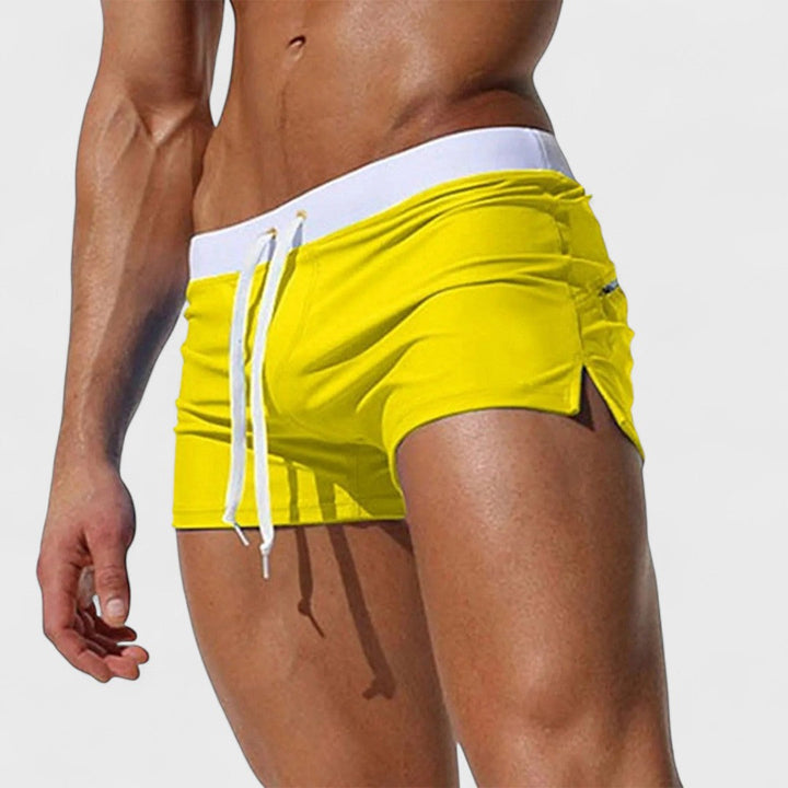 Moda masculina: traje de baño versátil y confortable para hombre. Estilo moderno, ideal para el verano.